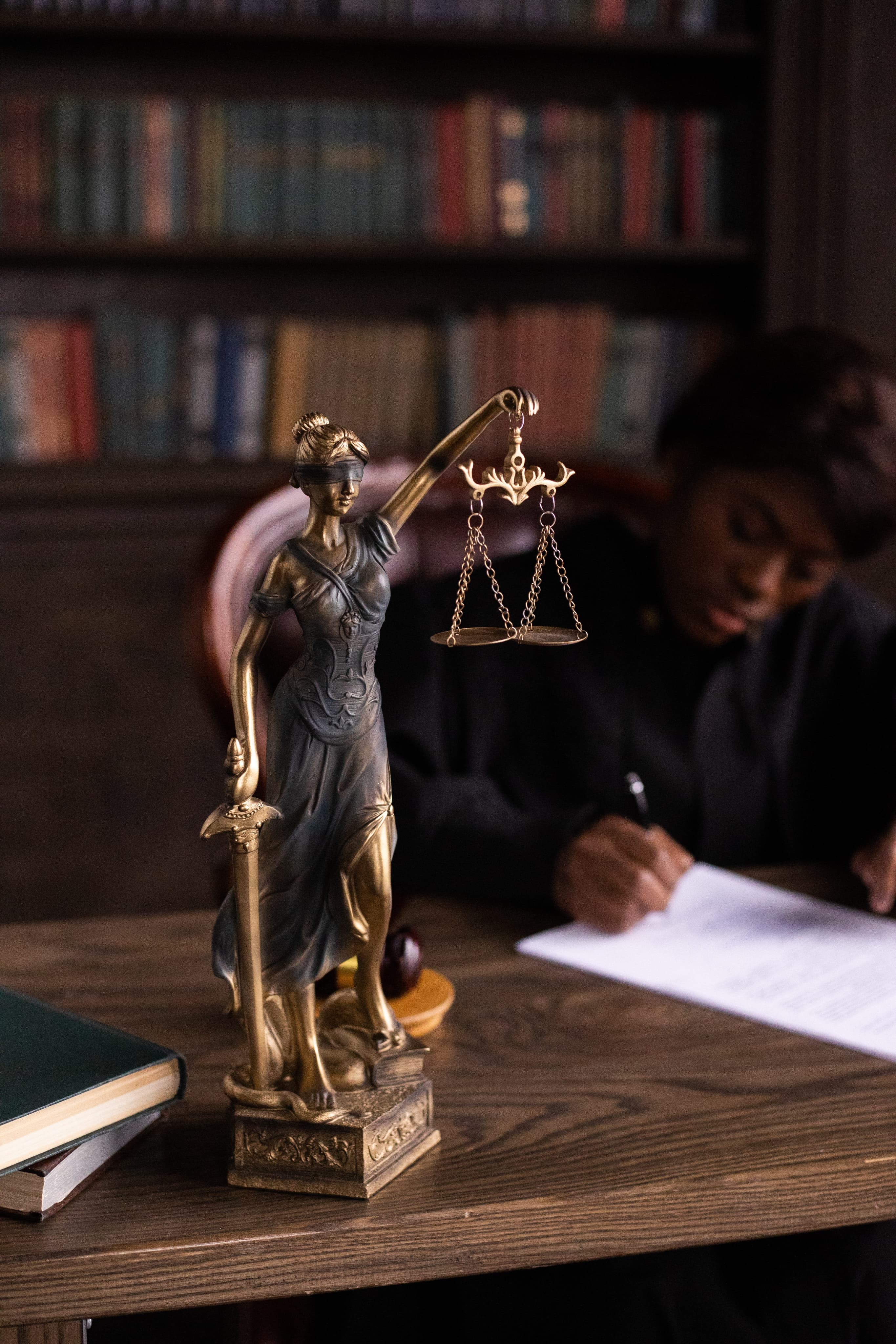 Scales of justice on lawyers desk