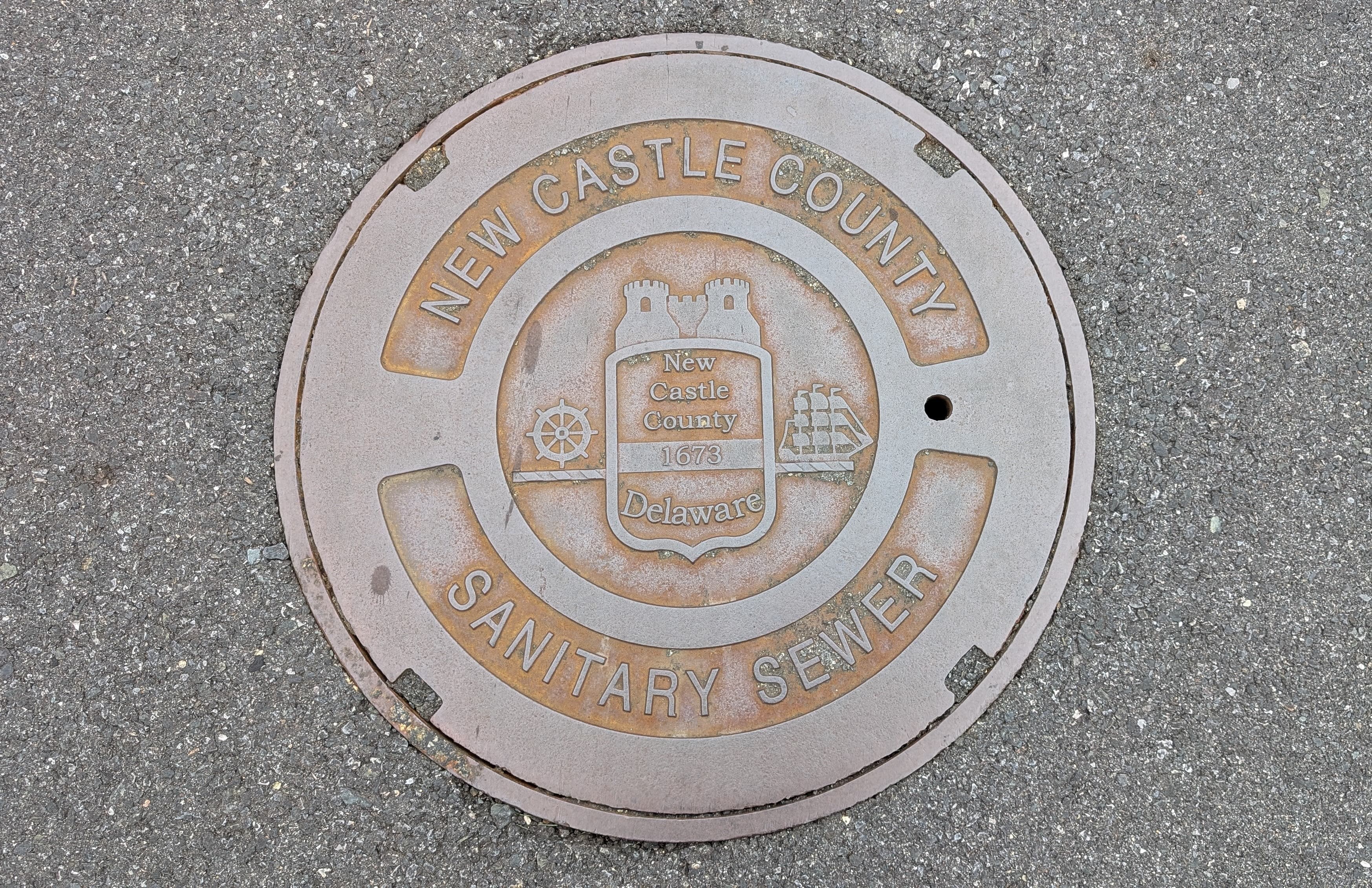 New Castle County-sewer-cover